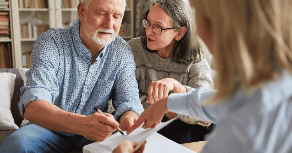 A couple looking over legal services for estate planning and issues at passing with MEUS Law